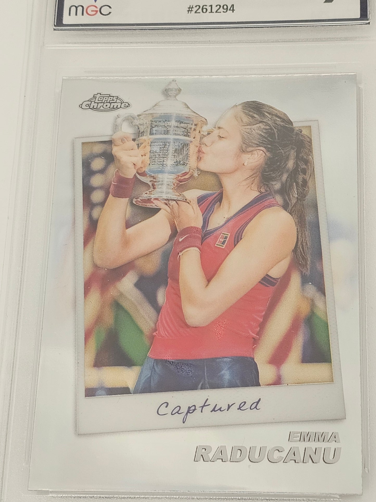 close up - EMMA RADUCANU 2024 TOPPS CHROME TENNIS - Captured Insert Silver Holo Refractor #CTD-EM (Graded Card, MGC9)